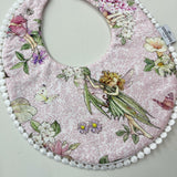 Babero Reversible Rosa con Encaje y Hadas
