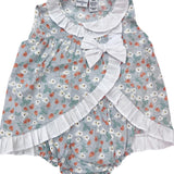 Jesusin cruzado con estampado floral.