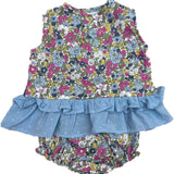 Jesusin con estampado floral y olan azul.