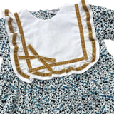 Jesusin con Estampado Floral y Moño Mostaza